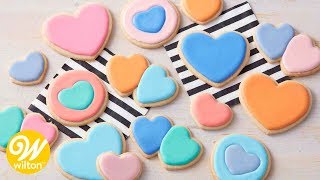 How to Make Thinned Royal Icing For Cookie Decorating  Wilton [upl. by Hamrah567]