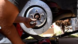 How to replace rear brakes and rotors on 2017 Dodge Challenger SRT 392 [upl. by Aihtnys]