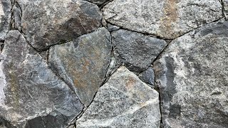 Secrets to creating a beautiful NATURAL STONE WALL Insights from a real stonemason [upl. by Wendt]