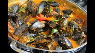 Mussels in a Spicy White Wine Tomato Sauce  CaribbeanPotcom [upl. by Huesman521]