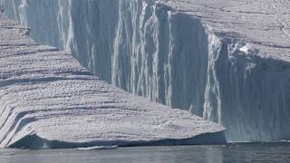 Large Iceberg Breaking near Ilulissat [upl. by Enelhtak]